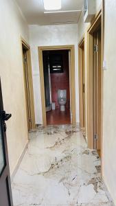 a room with ailed floor with a toilet in it at Villa Darija in Danilovgrad
