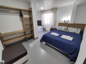 Postel nebo postele na pokoji v ubytování Villa Cosmopolita