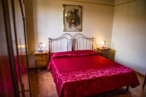 En eller flere senge i et værelse på Villa del Lago - Homelike Villas