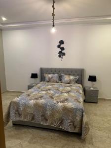 Postel nebo postele na pokoji v ubytování appartement à oujda