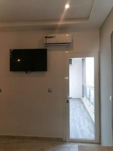 TV a/nebo společenská místnost v ubytování appartement à oujda