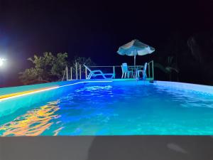 Bazén v ubytování Pradolago Sol Prado Tolima nebo v jeho okolí + 29 fotografií