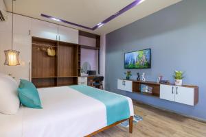 TV a/nebo společenská místnost v ubytování Homeland Villa Hoi An