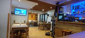 Lounge alebo bar v ubytovaní Penzion Zázrifka