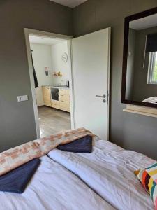 Postel nebo postele na pokoji v ubytování Apartment Skógafoss