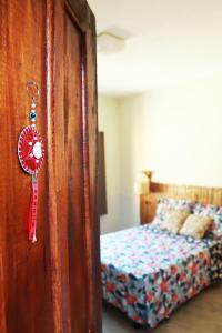 Postel nebo postele na pokoji v ubytování Santo Hostel
