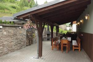 Patio nebo venkovní prostory v ubytování Chalupa Maršovka
