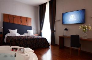 Voodi või voodid majutusasutuse The Code Hotel toas