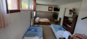 Katil atau katil-katil dalam bilik di Guesthouse Tadic