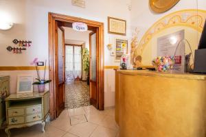TV a/nebo společenská místnost v ubytování Hotel Albachiara