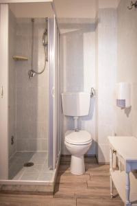 Koupelna v ubytování Hotel Albachiara