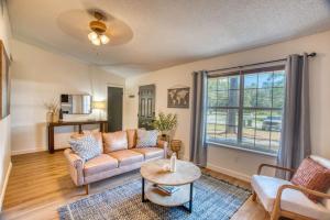 a living room with a couch and a table at Travel for work - Stylish 3 BDR - Southern Georgia in Moultrie