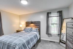 a bedroom with a bed and a window at Central Auburn Apartment with Porch Pets Welcome! in Auburn