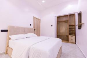 Postel nebo postele na pokoji v ubytování Rhema Apartments