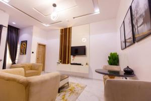 TV a/nebo společenská místnost v ubytování Rhema Apartments