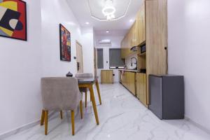 Kuchyň nebo kuchyňský kout v ubytování Rhema Apartments