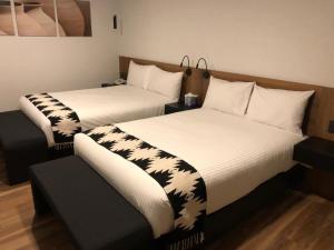 Postel nebo postele na pokoji v ubytování Casa Tlaxcalli by Beddo Hoteles