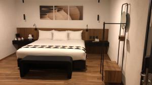 Postel nebo postele na pokoji v ubytování Casa Tlaxcalli by Beddo Hoteles