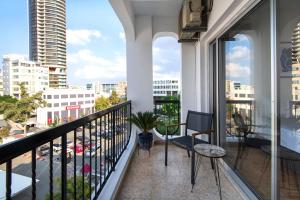 a balcony with a view of a city at Urban Condo 10 - 2 Bdr in Nicosia