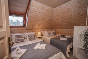 Krevet ili kreveti u jedinici u objektu Vila POGLED Wellness i spa