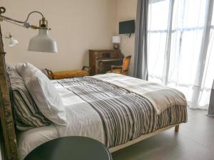 Postel nebo postele na pokoji v ubytování B&B Ramerino