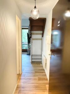 Ένα ή περισσότερα κρεβάτια σε δωμάτιο στο Duplex du Pailhet, T3 neuf, vue montagne, parking, navette et 2 vélos à disposition gratuitement +15 φωτογραφίες