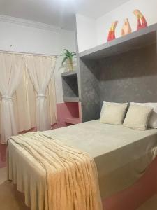 Ein Bett oder Betten in einem Zimmer der Unterkunft claussporto