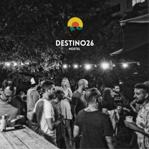 a black and white photo of a crowd of people at Destino26 Hostel in Montevideo