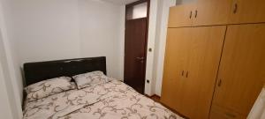 Postel nebo postele na pokoji v ubytování Apartman Spasojević