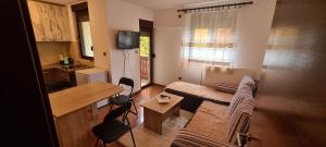 Kuchyň nebo kuchyňský kout v ubytování Apartman Spasojević + 8 fotografií
