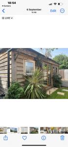 a picture of a house and a picture of a house at Kings head Inn in Stutton