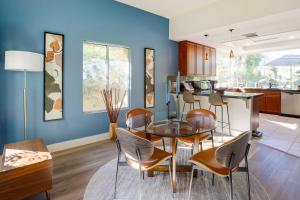 a kitchen and dining room with a table and chairs at Rancho Mirage Retreat Pool, Spa and Fireplace! in Rancho Mirage