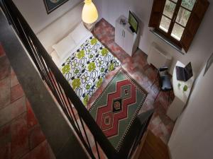 Posteľ alebo postele v izbe v ubytovaní B&B ai Condotti di Pisa da Filippo