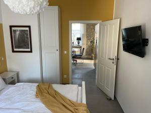 Postel nebo postele na pokoji v ubytování Ferienwohnung Basaltliebe Mendig
