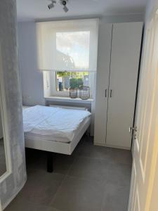 Postel nebo postele na pokoji v ubytování Ferienwohnung Basaltliebe Mendig