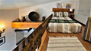 מיטה או מיטות בחדר ב-Casa do Campo Dornes Um