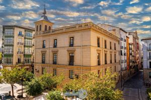 a building with a clock tower on top of it at EDIFICIO 1521 in Logroño