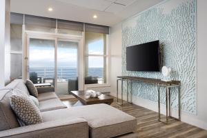 TV a/nebo společenská místnost v ubytování Ocean Place Resort & Spa