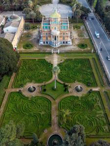 an aerial view of a garden in front of a building at B&B Maltese in Palermo