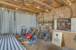 a group of bikes parked in a barn at Chincoteague Home with Pool - Walkable Location! in Chincoteague