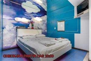 Ліжко або ліжка в номері Motel Porto dos Casais
