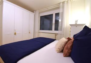 Una cama o camas en una habitación de “Opera House” Apartment Graz - Self Check-In