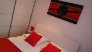 Postel nebo postele na pokoji v ubytování Apartments Marjan