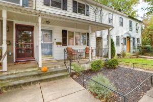 a house with an orange on the front porch at Centrally Located New Jersey Home with Private Yard in Lambertville