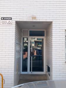 an entrance to a building with a glass door at PRIME ALOJAMNETOS 01 in Gondomar