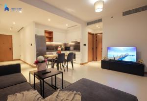TV a/nebo společenská místnost v ubytování Vida Marina Apartment