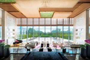 Area soggiorno di Sheraton Langfang Chaobai River Hotel