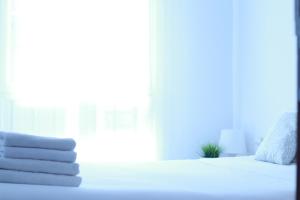 Кровать или кровати в номере Zubia Urban Rooms