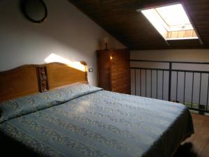 Posteľ alebo postele v izbe v ubytovaní Casa Tavasso