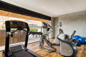 a gym with two exercise bikes in a room at UTOPIC Palacio Polanco by ULIV in Mexico City